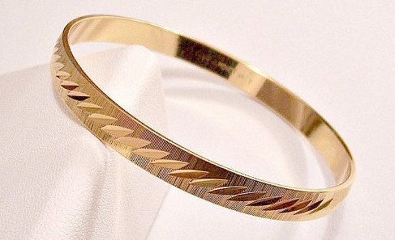 Vintage Monet Gold Tone Bangle