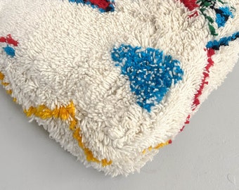 Pouf berbère marocain en laine Azilal écru à motifs colorés / coussin de sol fluo fait main