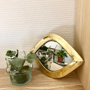Miroir cuivre doré laiton en forme d'oeil image 1