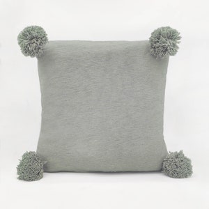 4 colors available! Cushion covers 100% cotton with pompoms 50x50cm! Handcrafted in Morocco