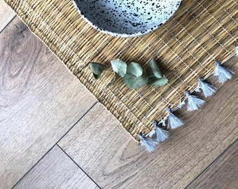 Manteles en pompones de oro y plata