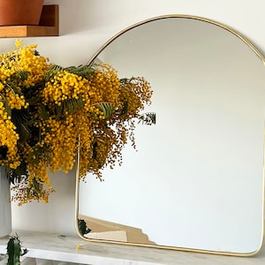 Golden brass arch mirror