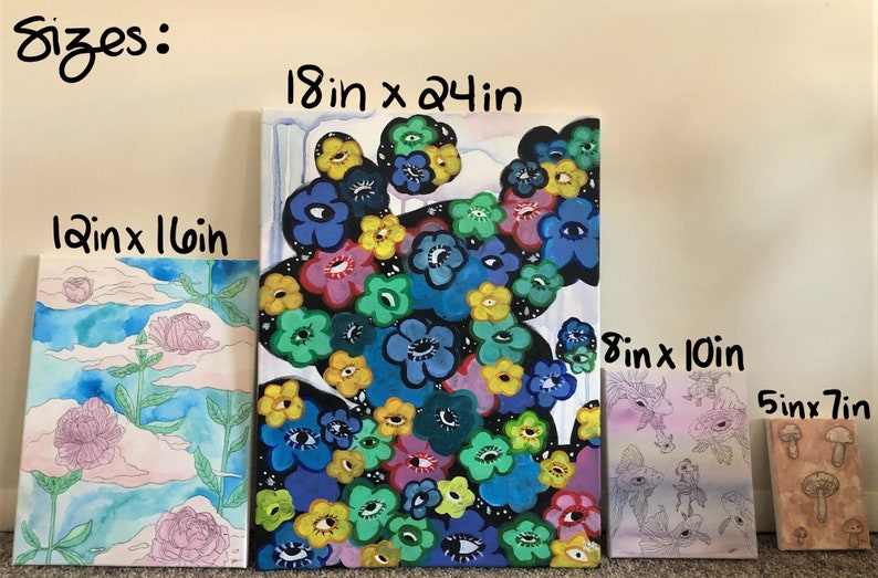 May include: Four different sizes of canvas paintings with various floral and eye designs. The sizes are 18 in x 24 in, 12 in x 16 in, 8 in x 10 in, and 5 in x 7 in.