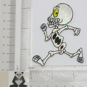 Sparkly Skeleton Iron On Patch  Measures 3 1/4&quot; tall x 2 3/8&quot; wide Embroidered on Opalescent Backing