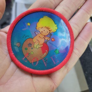 Cupid Holographic Iron On Patch: Changes to Heart (2.5" Circle)