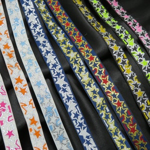 Jacquardlint 5/8" (15,8 mm) metallic sterren *kleuren* op maat gesneden