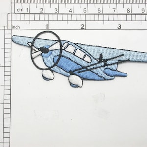 Prop Plane Applique Embroidered Iron On Patch in Blue 4 1/8&quot; x 1 3/8&quot;