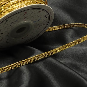 Vlecht 1/4" 6 mm 24 kt rijk goud per 10 Yard