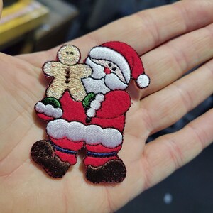 Toppa termoadesiva Babbo Natale con omino di pan di zenzero (2 5/8" x 2")