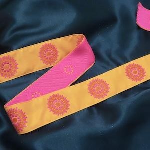Jacquard Ribbon 1 1/2&quot; Orange & Hot Pink Flower Mandala Woven Edge Priced Per Yard