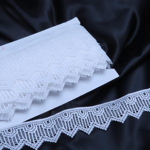 1 7/8" 57 mm Renda de serra branca brilhante 5 jardas