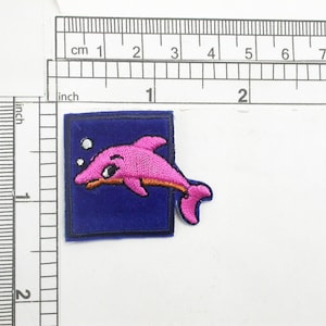 Dolphin Pink Iron On Patch Applique  Embroidered on Velveteen Backing Measures 1 1/4&quot; high x 1 1/2&quot; wide approximately