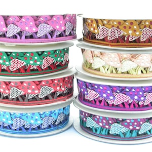 May include: Assortment of colorful mushroom-themed trim ribbon spools. Each spool features a different color and pattern of mushrooms.
