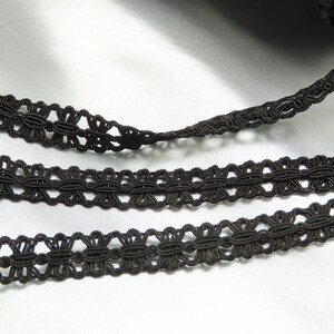 Trança 5/8" 16mm fantasia rayon preto por jarda acabamento de costura