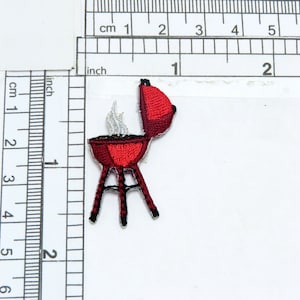 May include: Red and black embroidered iron-on patch of a grill with a lid open and smoke coming out.