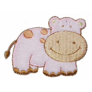 May include: Pink and brown embroidered iron-on patch of a smiling cow with brown spots.