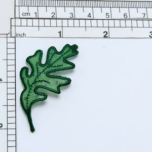Oak Leaf Sheer Glitter Dot Green Iron On Applique Measures 2 1/8&quot; long x 1&quot; wide