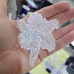 Orchid White Sparkle  Embroidered Iron On Patch Applique Measures 3" x 3 3/8" approximately