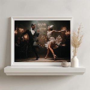 May include: A framed print shows a couple dancing in a ballroom. The man is in a black tuxedo, and the woman wears a fringed dress. The background features chandeliers and a smoky atmosphere, creating a vintage, elegant feel.