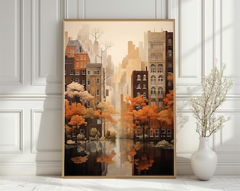 May include: Framed art print depicting a cityscape with buildings and trees in autumn colors. The artwork features a reflection of the city in a body of water. The color palette includes shades of orange, brown, and beige.