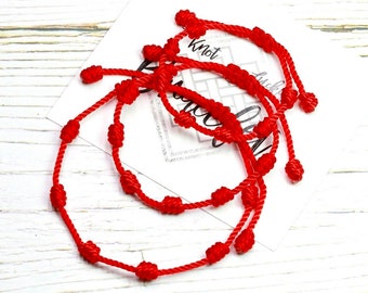 Bracelet de protection rouge espagnol 7 noeuds Famille original véritable protection contre le mauvais œil (mal de ojo) mère père enfants