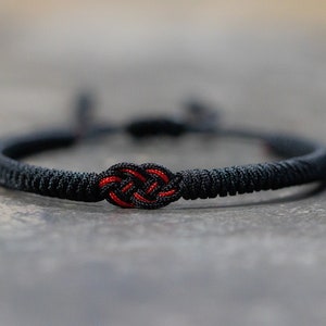 Pulsera trenzada tibetana budista hecha a mano para hombre y mujer, pulsera de cuerda trenzada, pulsera de nudos de la suerte, pulsera para yoga y meditación. imagen 1