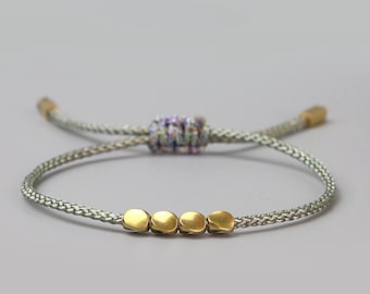 Bracelet tibétain tressé avec noeuds porte-bonheur Perles de cuivre / Bracelet tressé / Bracelet de prière et de méditation yoga / Bracelet pour femme