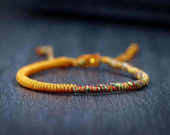 POSITIVITY  Handmade Buddhist Tibetan Braided bracelet for men and women, braided rope bracelet, lucky knots bracelet, yoga and meditation.