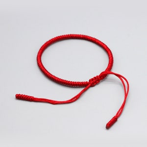 Bracelet rouge tibétain bouddhiste fait à la main, bracelet à nœuds chanceux tressés tibétains minces, bracelet homme femme, bracelet tressé image 6