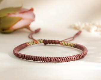 Pulsera budista en color marrón / Cordón con nudo corredizo