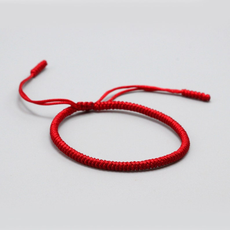 Handgemachtes buddhistisches tibetisches rotes Armband, dünnes geflochtenes tibetisches Glücksknotenarmband, Mannfrauenarmband, geflochtenes Armband Bild 1