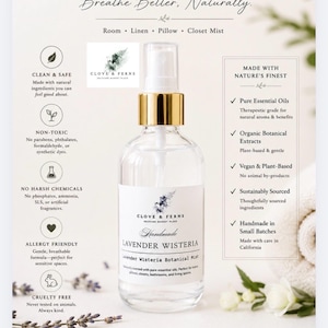 May include: A clear glass spray bottle with a gold collar and white pump, labelled Clove & Ferns Lavender Wisteria Botanical Mist. The label features text detailing ingredients and benefits, surrounded by lavender sprigs and white flowers.
