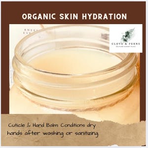 May include: A clear glass jar filled with a creamy, off-white balm. The jar is labeled "Cuticle & Hand Balm" and "Conditions dry hands after washing or sanitizing." The text "Organic Skin Hydration" is at the top. The jar is tied with twine.