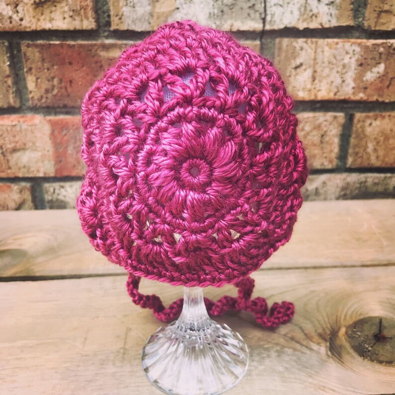 Newborn baby girl crochet sweater and bonnet outfit
