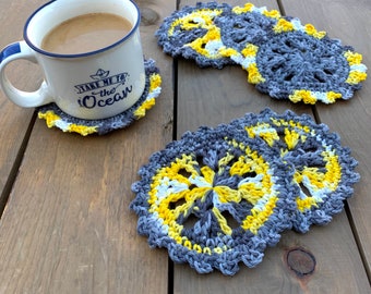 Set of six crochet beverage coasters in grey and yellow