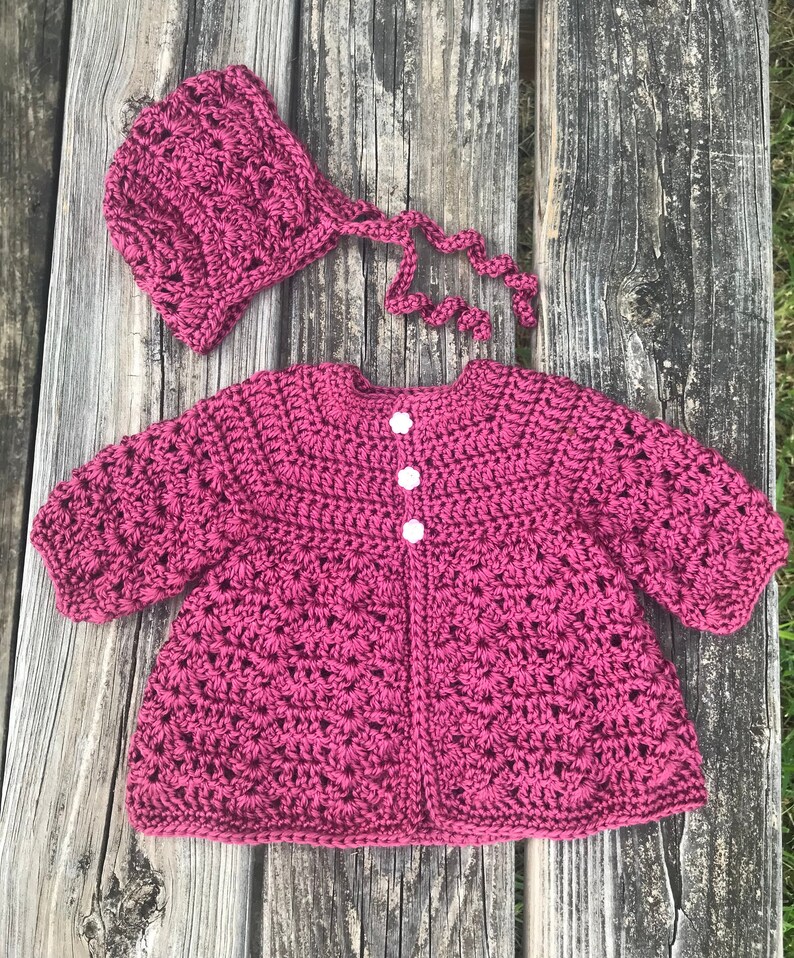 Newborn baby girl crochet sweater and bonnet outfit