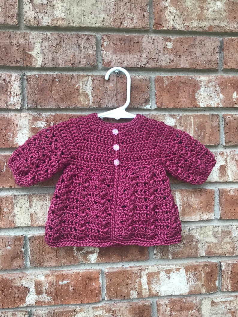 Newborn baby girl crochet sweater and bonnet outfit