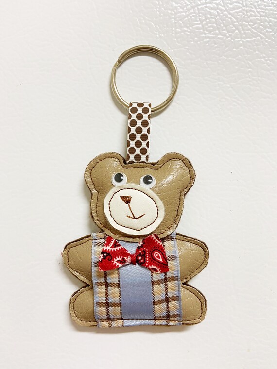 Skateboard Bär Plüsch-Schlüsselanhänger - Niedlicher Teddy Mit Skateboard Accessoire