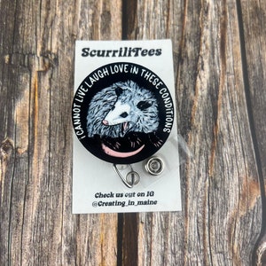 Opossum Badge Reel: I Cannot Live Laugh Love