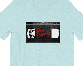 VHS 80年代ホラー半袖ユニセックスTシャツ