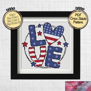 May include: Framed cross-stitch pattern with the word "LOVE" in red, white, and blue, featuring stars and stripes. The heart is designed with the American flag. Includes text: "SALE! Buy 2 Get 1, Buy 5 Get 3, Buy 10 Get 10" and "PDF Cross Stitch Pattern".