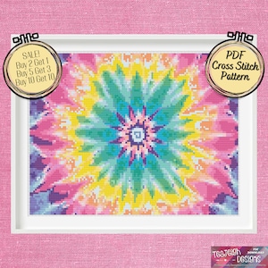 Könnte beinhalten: Ein farbenfrohes Batik-Muster in den Farben Pink, Gelb, Blau und Grün. Dies ist ein PDF-Kreuzstichmuster.
