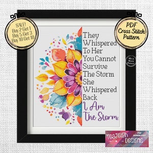 Puede incluir: Un patrón de punto de cruz con un diseño floral colorido y el texto "They whispered to her you cannot survive the storm she whispered back I am the storm".
