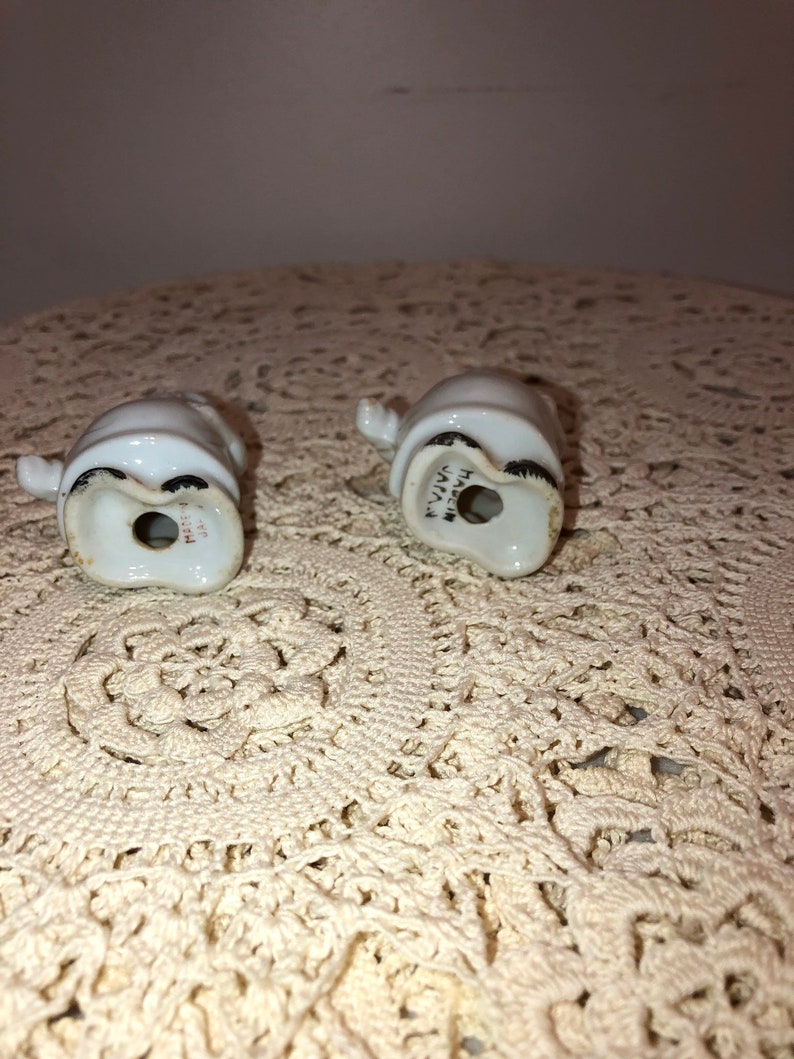 Paint rubbed off in places Chef salt and pepper shakers see pics. vintage Sunshine Crackers bakers salt and pepper set