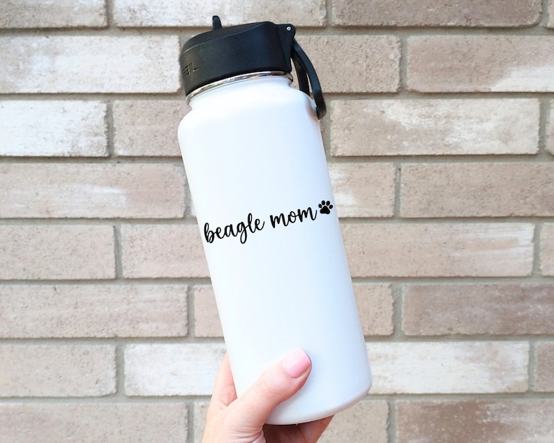 Black Beagle Mom decal with a paw print placed on a water bottle.