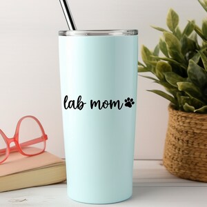 Black Lab Mom decal with a paw print placed on a tumbler.