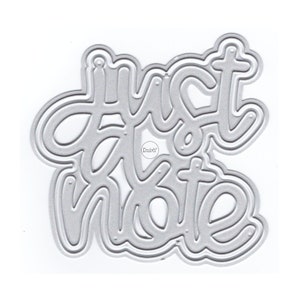 May include: A silver metal die cut with the words "Just a note" in a handwritten style.