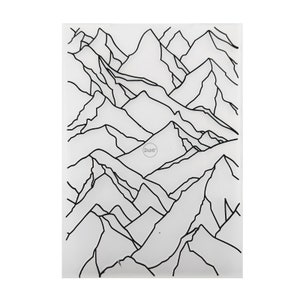 May include: A clear stamp sheet with a design of black line art mountains. The stamp sheet is labelled "Daisies".
