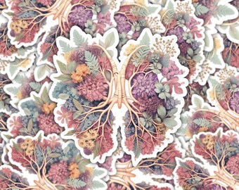 May include: A sticker featuring a floral lung design. The lungs are filled with a variety of flowers in shades of pink, purple, yellow, and green. The roots and branches of the lungs are a light brown color. The sticker has a white border.