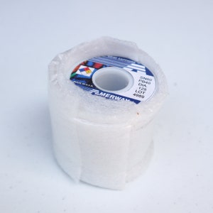 May include: A roll of solder wire with a blue and white label. The label reads "SN60 PB40 DIA. 1.25 LOT 4989" and "MERWAY" in a blue banner. The label also includes a small American flag graphic.